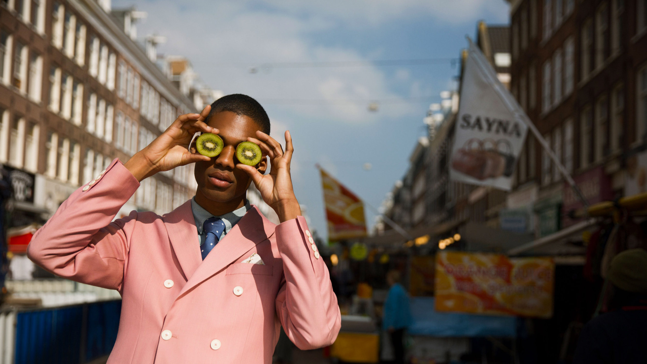 Sir Hotels - model in purple jacket